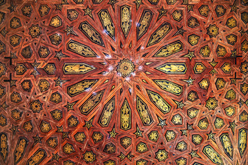 Detail of the wooden ceiling in the royal palace Nazaries of the Alhambra, Granada, Andalucia, Spain - obrazy, fototapety, plakaty