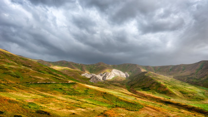Fototapeta premium Thunderstorm along the Pamir Highway, taken in Tajikistan in August 2018 taken in hdr