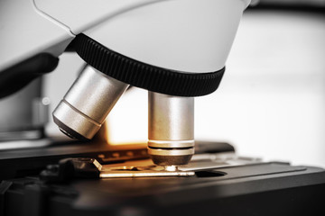 Close up microscope in laboratory.