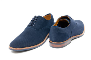 Blue suede shoes isolated on white background