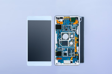 Parts of disassembled smartphone. Details of disassembled smartphone open view