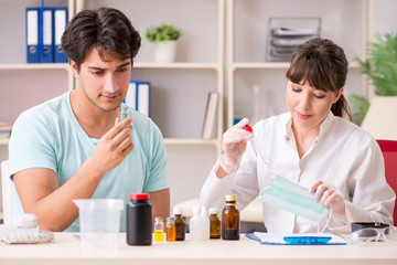 Doctor getting saliva test sample in clinic hospital