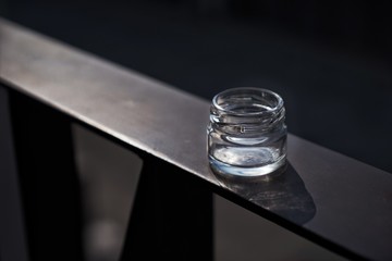 glass of water on black background