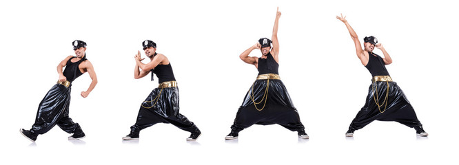 Rap dancer in wide pants on white