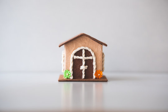 Closeup miniature house on white background using image for property real estate investment concept