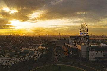 Beautiful Jakarta cityscape with ferris wheel at dusk
