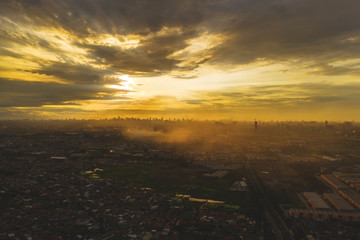 Crowded residential houses under beautiful sunset