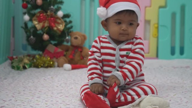 Cute baby boy santa