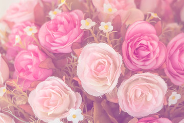 Fototapeta na wymiar Beautiful decoration artificial rose flower background for valentine day or wedding card.
