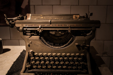 old typewriter on wooden background