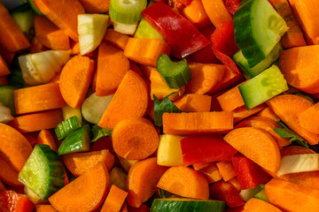 different varieties of vegetables cut into small pieces