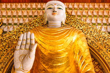 Buddha statues in the Dhammikarama Burmese Buddhist Temple,and it is situated along Burma Lane in...