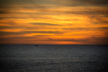 Fototapeta premium sunset over the ocean in Naples Florida
