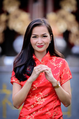 Portrait of Asian Chinese and Thai girl with Happy Chinese New Year concept.