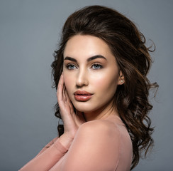 Naklejka premium Beautiful young woman with a long brown hair