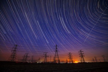 High-voltage towers and stellar trajectories