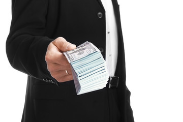 Business man holding money on white background