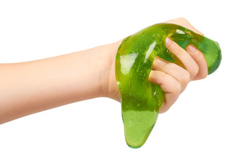 kid playing green slime with hand, transparent toy