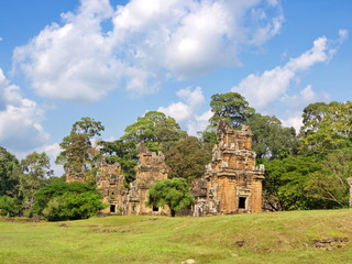 Ta Prohm the temple ruins overgrown with trees at Angkor Wat in Seam Reap City, Cambodia in 2012 ,...