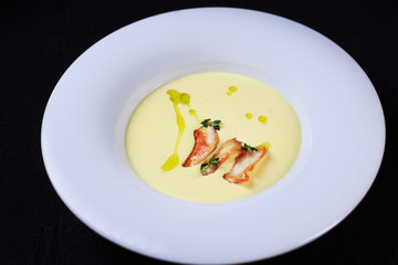 cheese cream soup with grilled chicken, tasty nourishing lunch, starter meal. european cuisine, healthy food, restaurant menu