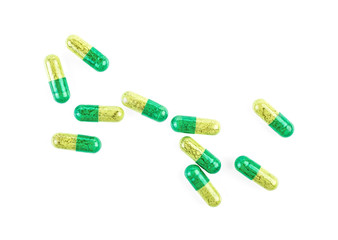 Colored pills isolated on white background, top view.