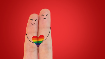 Painted fingers, happy couple in love with rainbow color heart smiley and hugging, Valentines day...