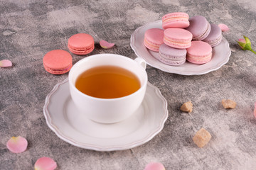 Wedding, St. Valentine's Day, birthday, preparation, holiday. Beautiful pink tasty macaroons on a...