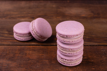 Wedding, St. Valentine's Day, birthday, preparation, holiday. Beautiful pink tasty macaroons on a concrete background