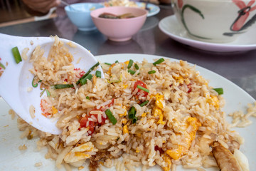 Fried rice on white plate in Thailand
