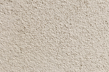 wall. plaster applied to it. composition of small stones. and in a special way pounded