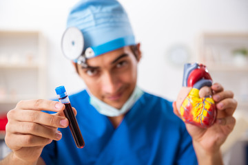 Mad doctor working in the clinic 