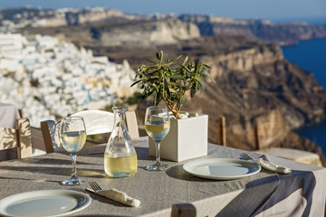 Table with a bottle of wine and glasses