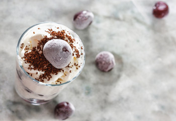 Ice cream with cherry berries on  beautiful marble countertop background