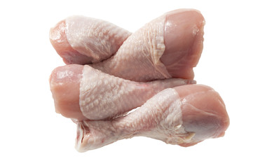 raw chicken legs on white