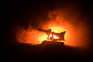 Rocket launch with fire clouds. Battle scene with rocket Missiles with Warhead Aimed at Gloomy Sky...
