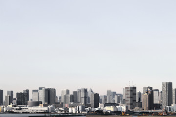 Fototapeta na wymiar A scenery of a high-rise apartment that stands on the waterfront in Tokyo
