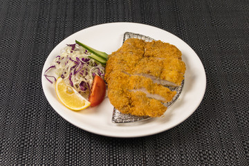 Close up view of plate with japanese food inside. Japan traditional food on wooden table. Selective focus