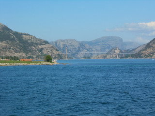 Fototapeta premium Norwegian fjord and mountains in summer. Lysefjord, Rogaland, Norway. Lysefjord bridge to Forsand