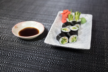Japanese sushi set with ready to serve. Beautiful eastern style table decoration with sushi.