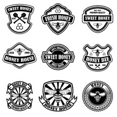 Set of vintage honey labels template. Bee icons. Design element for logo, label, emblem, sign, poster.
