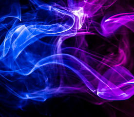 Colored smoke on black background