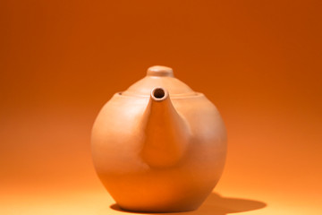 teapot on orange