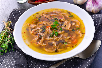 Traditional tripe soup in polish style with beef and vegetables