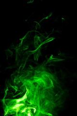 Green smoke on black background