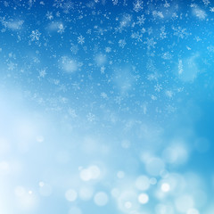 Blue Christmas background with snowflakes and blurry lights. EPS 10