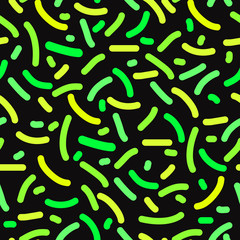 Seamless pattern of colored sprinkles in vector