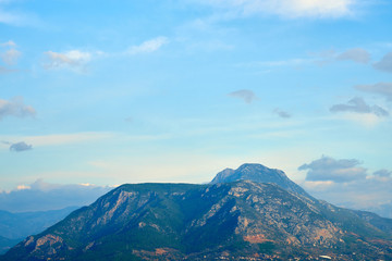 Rocks in Alanya, Turkey under cloudy sky on a sunset. 