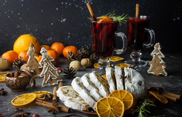 Traditional stollen and milled Hot wine cake and Christmas decorations