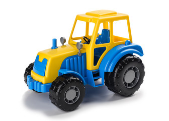 Children's toy tractor on a white.