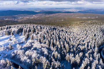 Aerial view, snowy trees and a road from above in winter, Taunus, Hesse, Germany